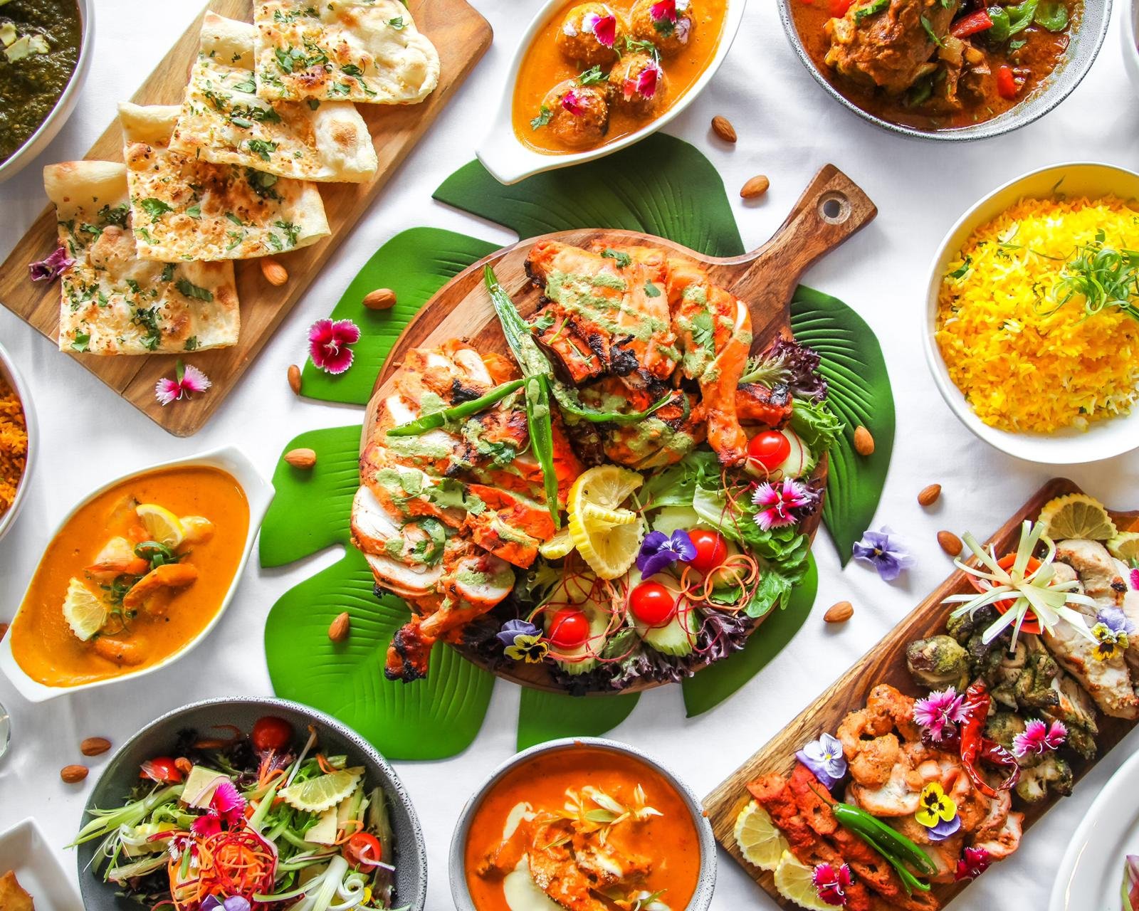 Warm ambience and platter of Indian dishes